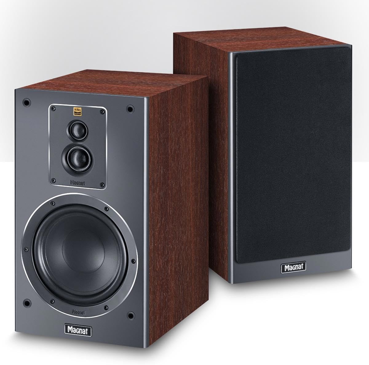 Pair of Magnat Signature 503 speakers, one with grille, one without