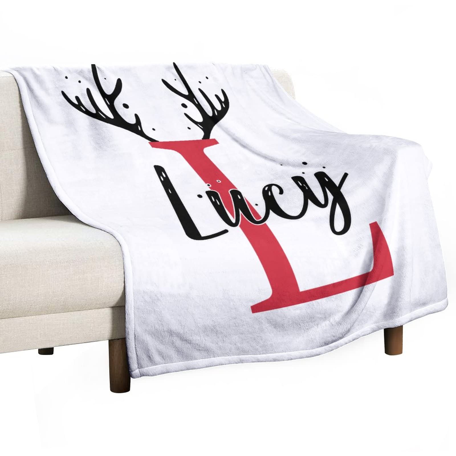 Couverture douillette double face lit et canapé motif lettre L de Noël