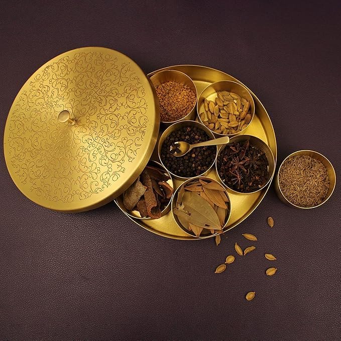 Image of Golden Metal Made Decorative Spice Box with Embossed Lid | Handcrafted Metal Masala Dabba For Kitchen With Spoon (7 Containers, 40 Ml) | Indian Spice Storage Organizer with Lid
