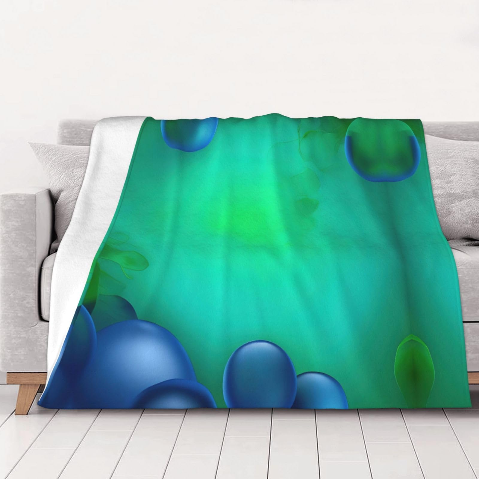 Couverture super douce bleu sarcelle idéale pour vos soirées cocooning sur le canapé
