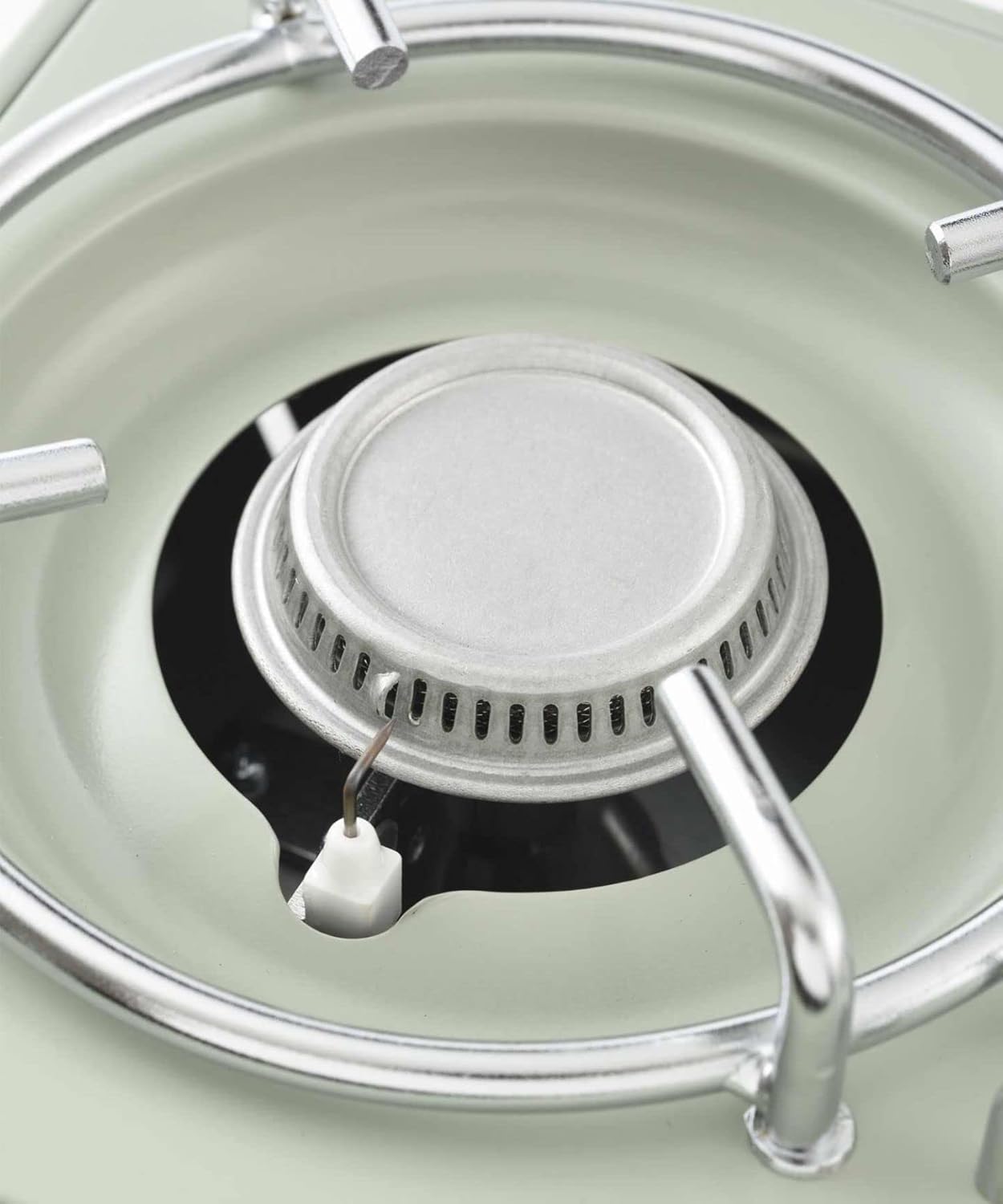 Dettagliato view of the piezoelectric igniter and burner head on the BRUNO BOE094-IV Cassette Stove.