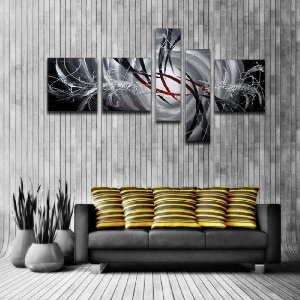 Peinture suspendue salon pour habiller un grand mur vide et blanc