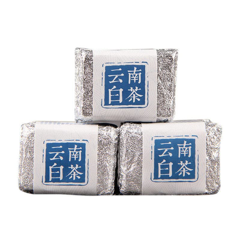 Thé blanc de Yunnan de prestige, brique aux effluves de miel et fleur 500g