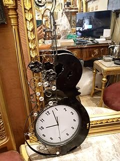 ساعة جيتار حديد فورفورجية