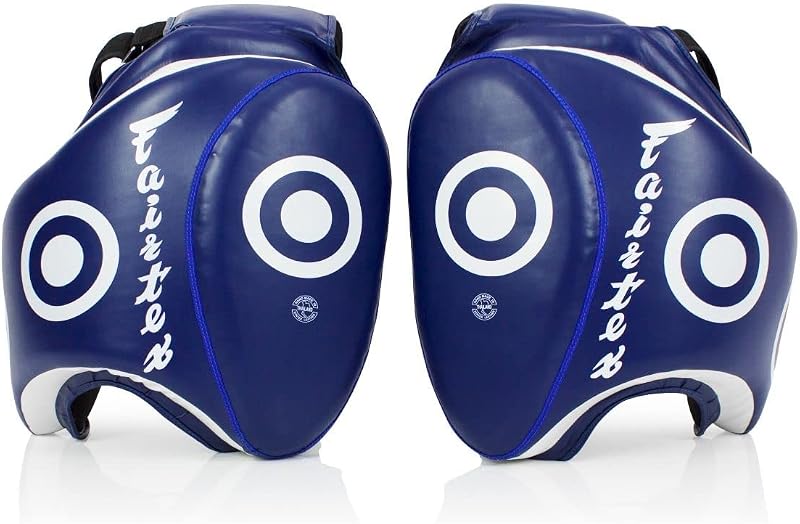 Fairtex Syntek Leather Thigh Pads, Muay Thai MMA Kickboxing Training Gear | Premium microfiber exterior with multi-layer high-density foam. Strapped leg guards cushion full-force low strikes