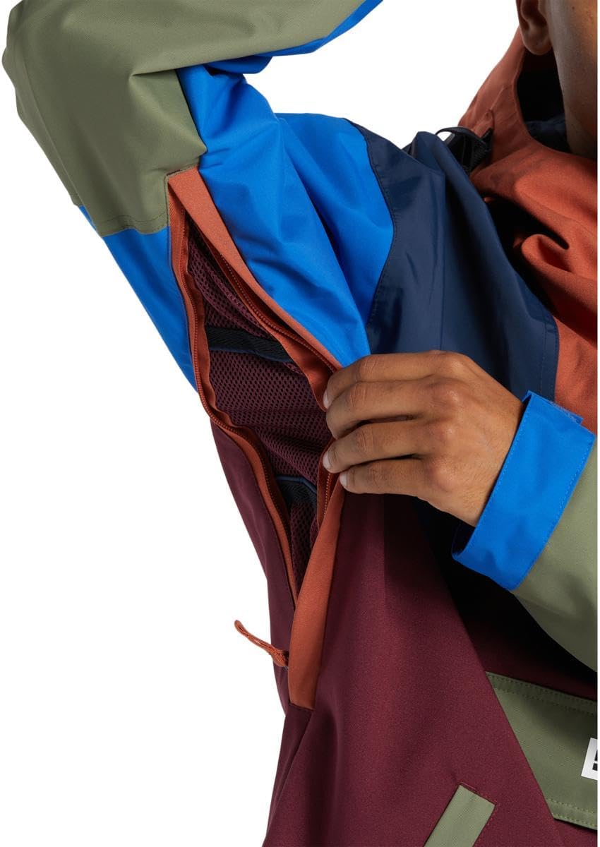 Close-up of a person opening the armpit vent on the DC Shoes DC-43 Anorak Snowboard Jacket.