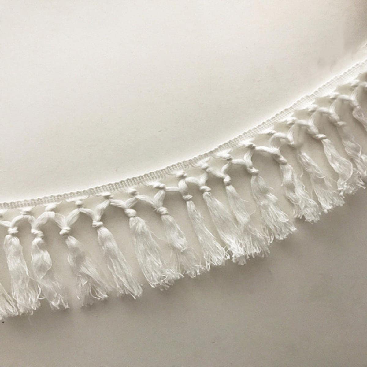 Dentelle 10 cm blanche de 3 mètres avec frange à nœuds pour rideau