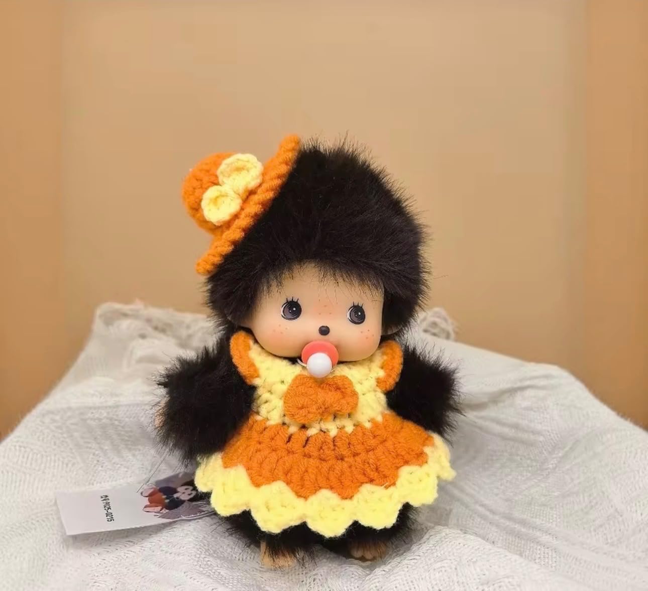 Cute Doll Keychain with Soft Hair, Black Knit Outfit, Pacifier Detail, Bag Charm Collectible Accessory