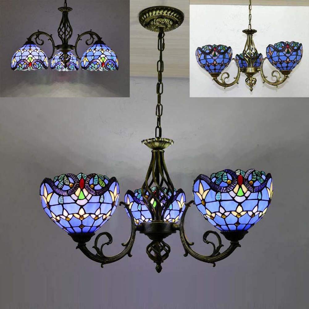 Lustre d'entrée en verre et laiton pour une lumière accueillante