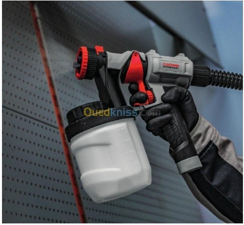 Person using CROWN CT31015 Spray Gun