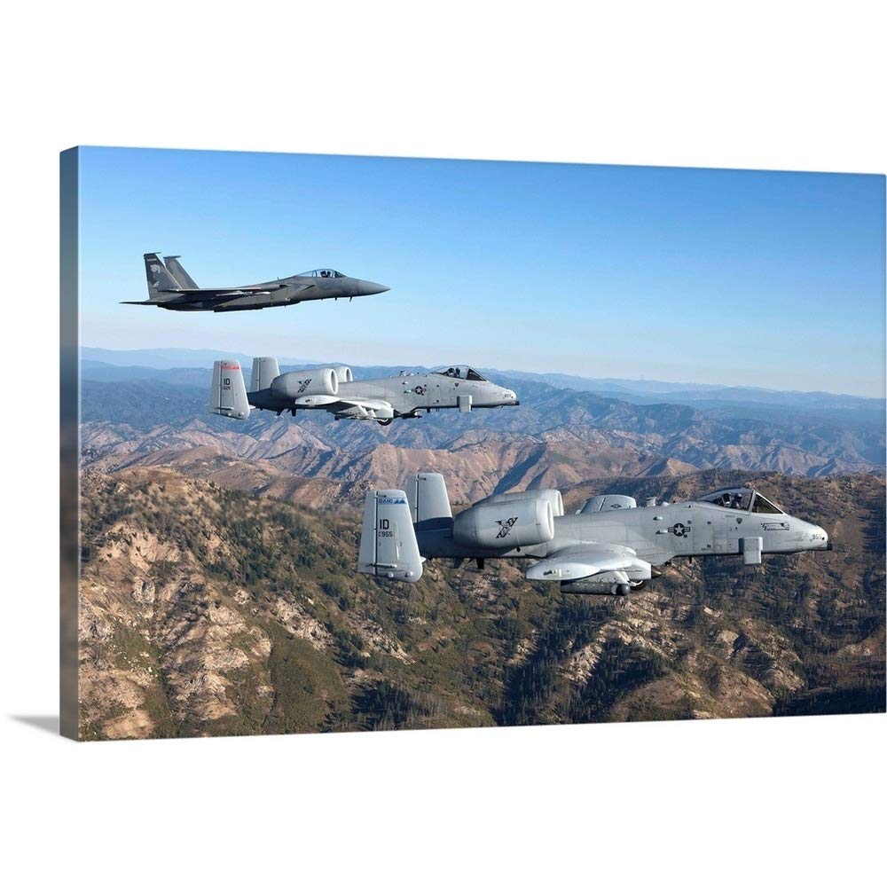 CANVAS ON DEMAND An F-15 Eagle and Two A-10 Thunderbolts in Flight Over Central Idaho Canvas Wall Art