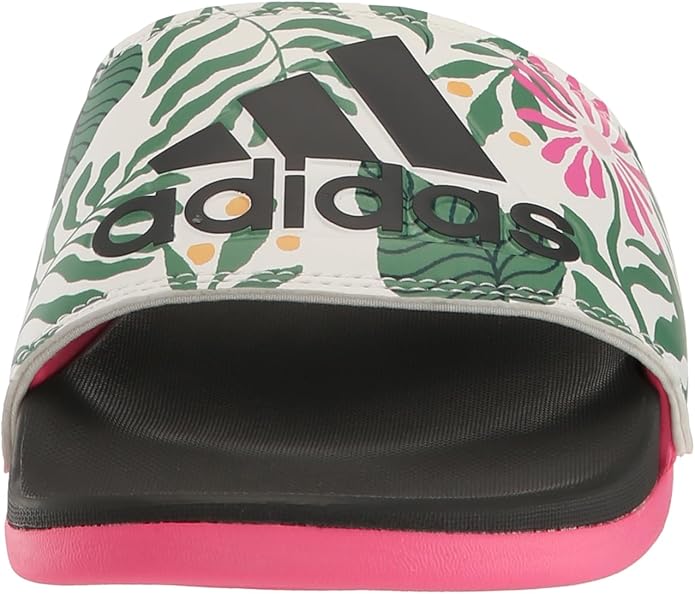 adidas Women's Adilette Comfort Slide Sandal Synthetic upper for durability and light weight, Contoured footbed offers step-in comfort