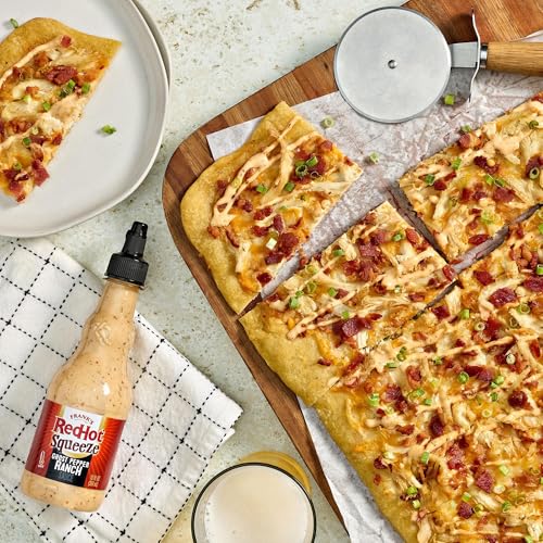 Image of Frank's RedHot Hot Sauce, Ghost Pepper Ranch, Squeeze Bottle, Hot Heat, Ghost Pepper Heat and Cool, Creamy Ranch, Squeeze On Burgers, Pizza, Salads, Sandwiches, Wraps, Dip with Veggies, Chicken Tenders, and Fries, 12 fl oz