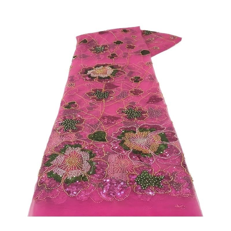 Dentelle à paillettes de coton rose pour confectionner une robe de soirée chic