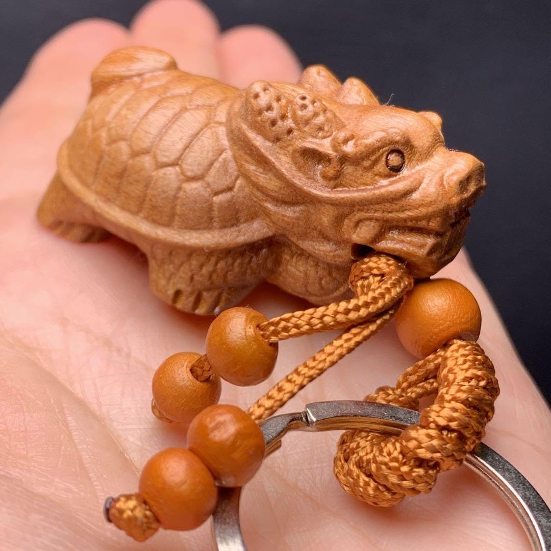 061501    桃の木素材龍亀手彫り2個セット　約24*42ミリ 061501 桃の木素材龍亀手彫り2個セット 約24*42ミリ