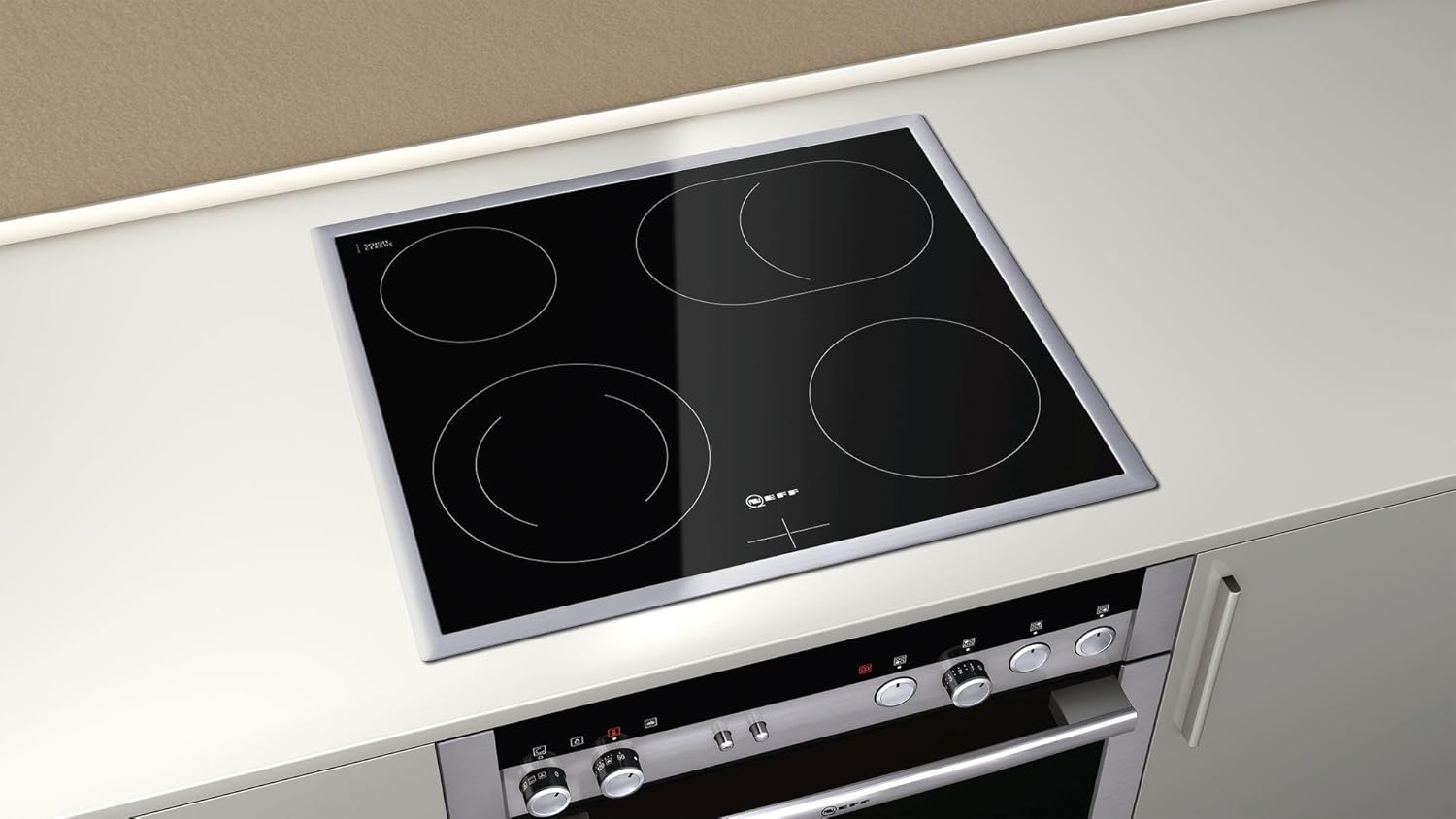 Neff induction hob installed in a modern kitchen countertop above a compatible Neff oven