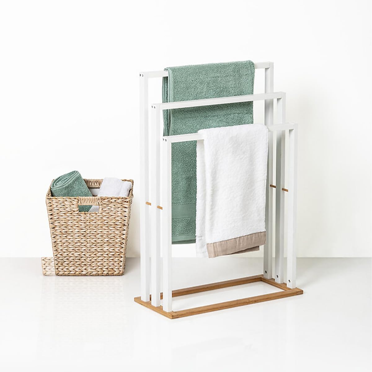 Towel rack in a bathroom setting with towels