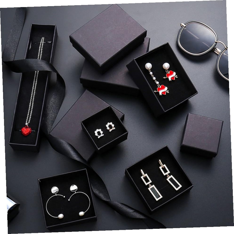 Boîte de rangement bijoux format voyage pratique pour transporter vos parures