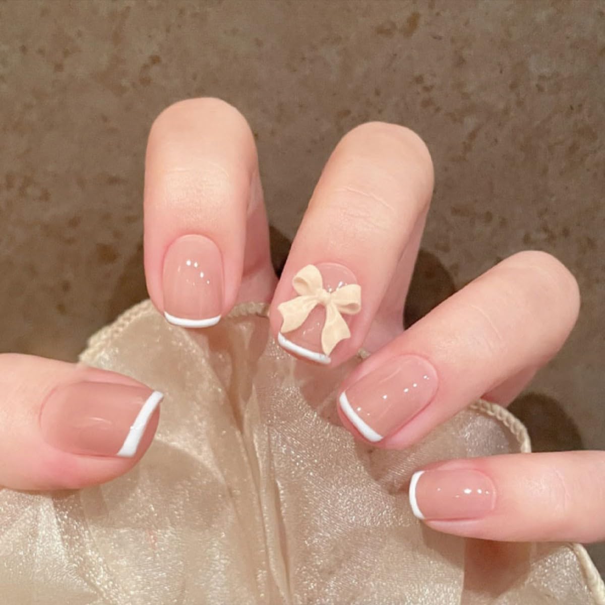 Short Press on Nails 24PCS French Nails with White Bowknot Fake Nails with Glue Artificial Stick on Nails Full Cover Nails Tips for Women and Girls Nude Pink (Short Press)