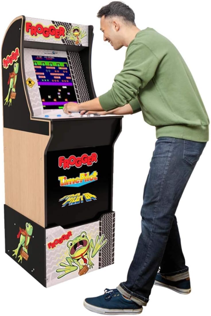 Person playing ARCADE1UP Frogger Arcade Game