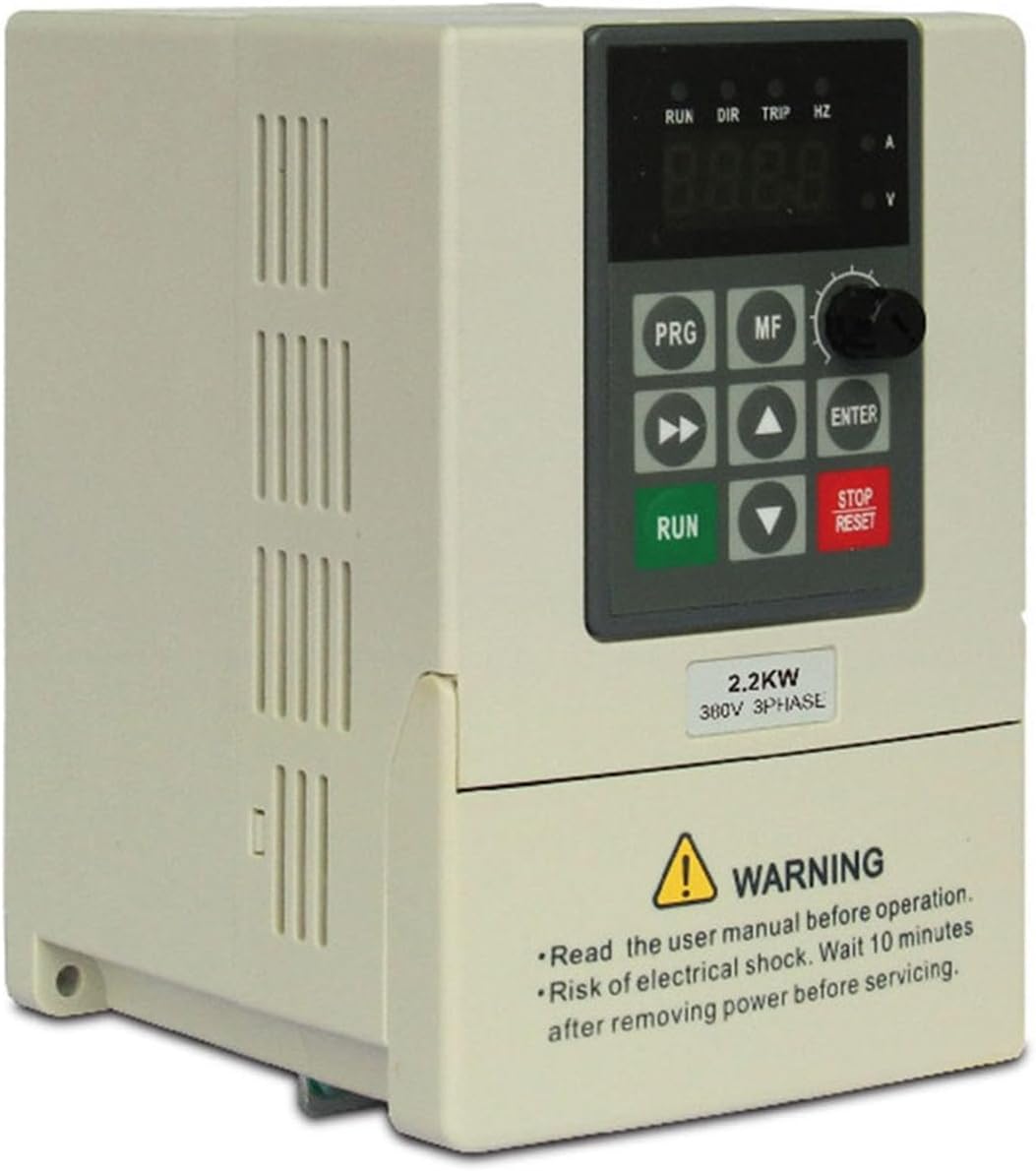 Close-up of the frequency inverter control panel with labeled buttons and indicators