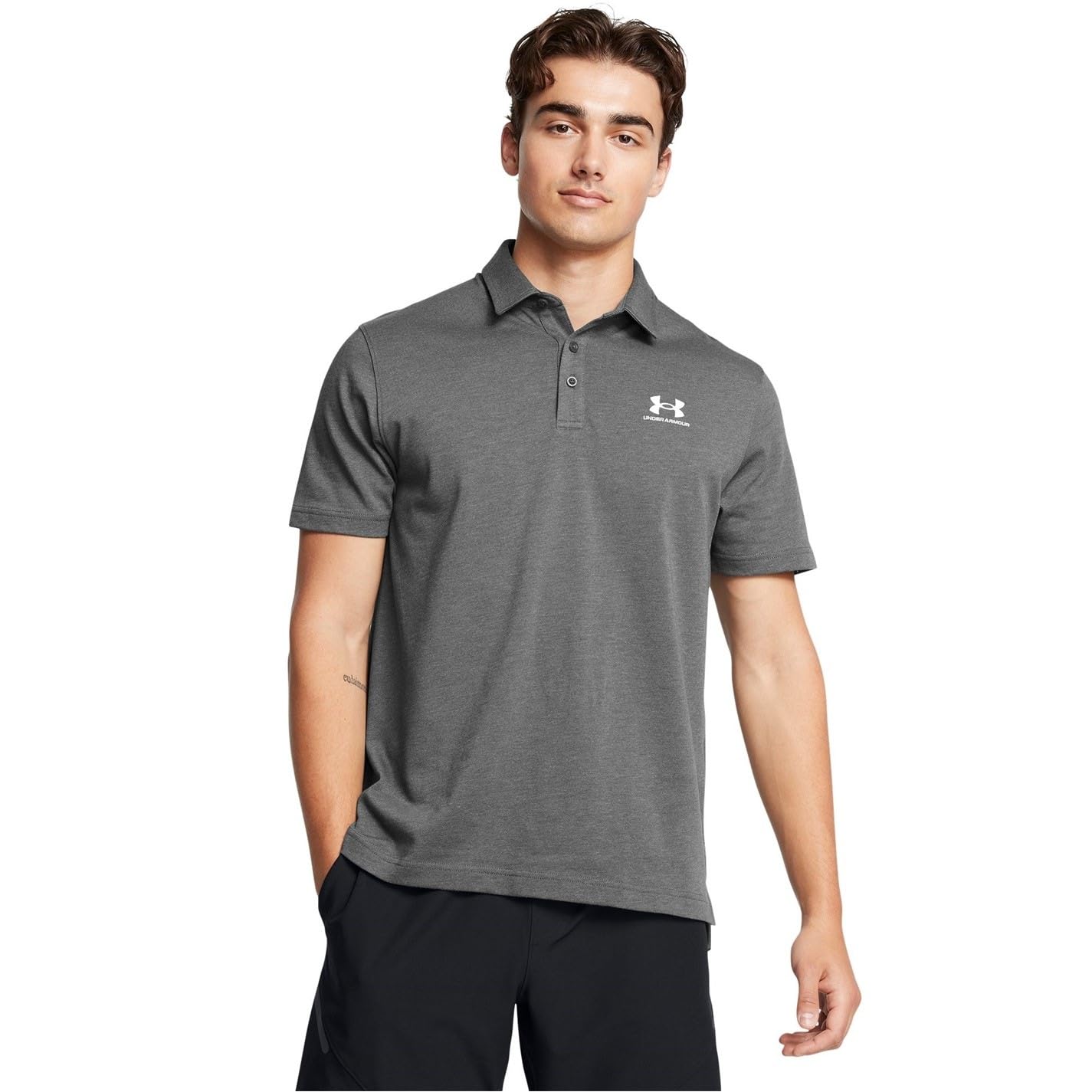 Under Armour Poloshirt Icon | Weiches und bequemes Jersey-Strickmaterial. Polokragen mit Knopfleiste. Seitliche Schlitze am Saum.