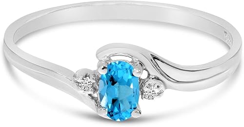 Miniatura 6 de Anillo de oro blanco de 10 quilates con topacio azul ovalado y diamante