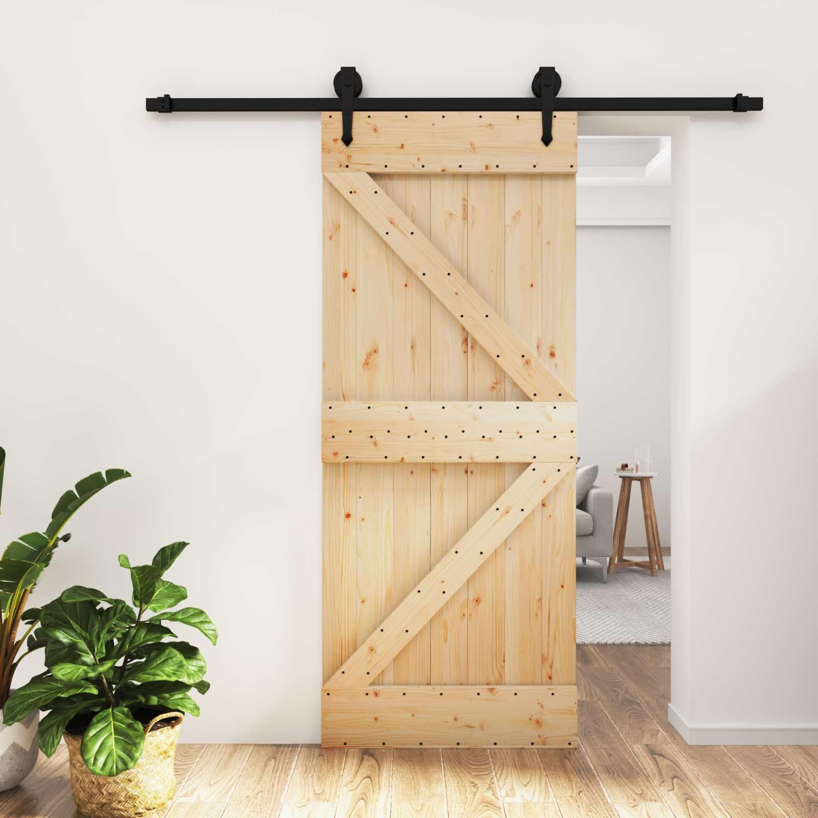 Nowoczesne drzwi przesuwne z litego drewna sosnowego, 85 x 210 cm, naturalne i czarne, z malowanymi proszkowo stalowymi szynami i zajmującą niewiele miejsca konstrukcją dla płynnych przejść
