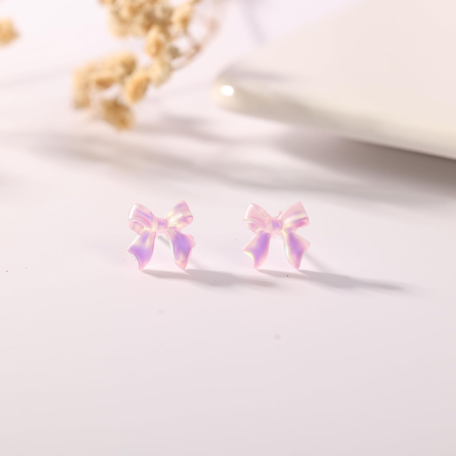 AoedeJ 6 Pairs Plastic Glow Earrings - Stud, Bow Designs for Women - Image 6