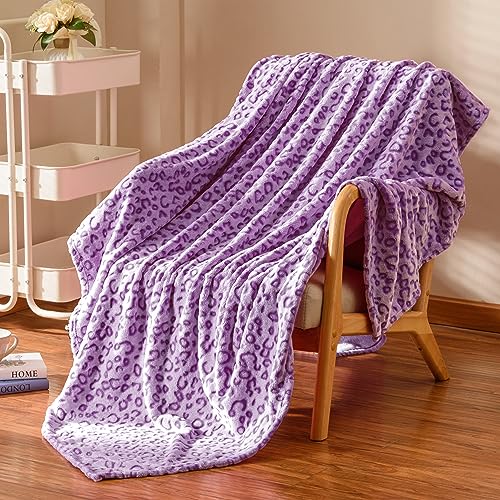 Couverture en flanelle polaire léopard pour vos soirées canapé