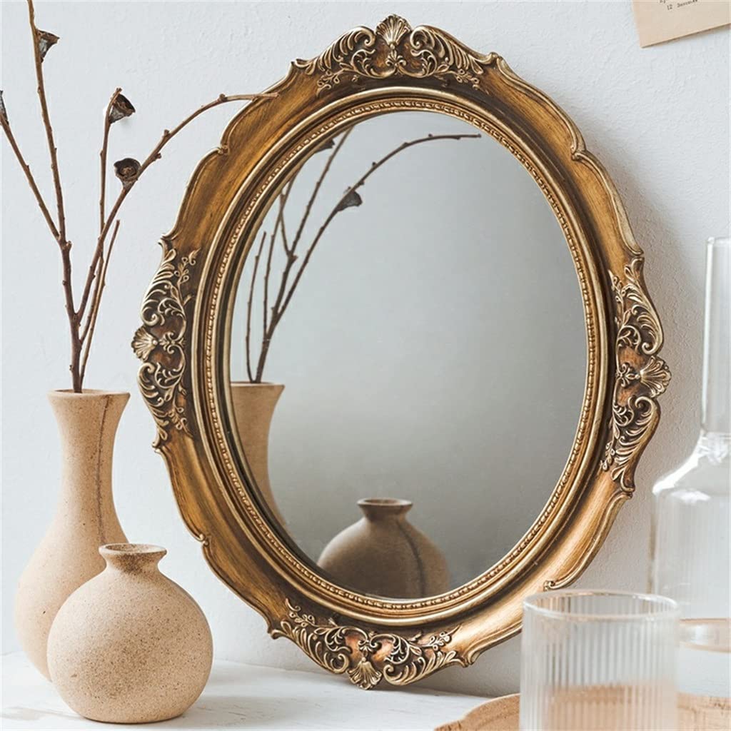 Miroir en résine ovale doré vintage aux finitions artisanales