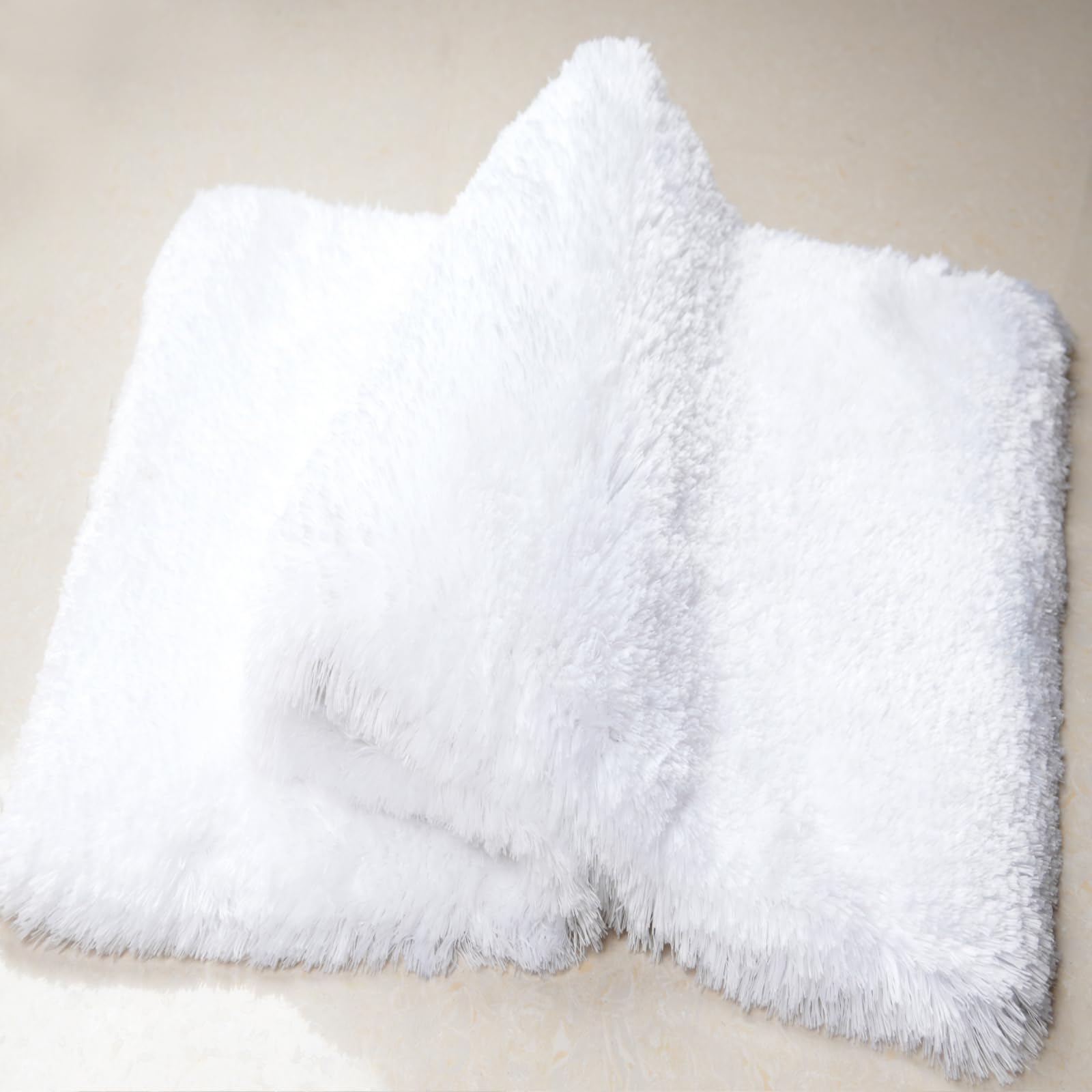 Photo 1 of **USED/DIRTY**
Soft Absorbent Pearl Yarn Rug, Rubber Backing, Machine Wash Dry, Non Slip Bath Rug Carpet (White, 17" x 24") 17" x 24"