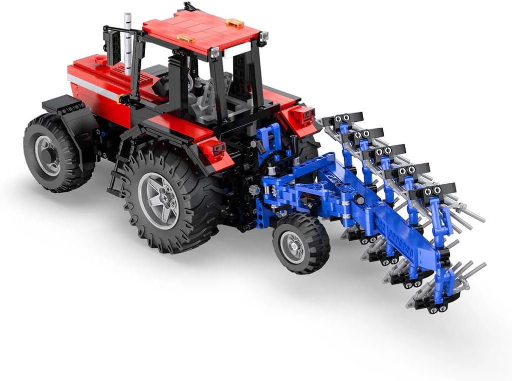 CaDA C61052W Farm Tractor with plough attached, front-side view
