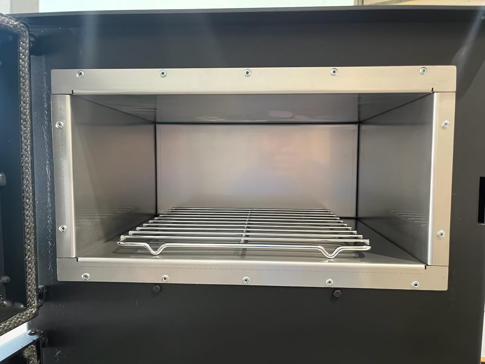 Poêle à bois classe A+ avec compartiment de cuisson - En acier inoxydable Verso F - 9 kW - Four à bois multiusage