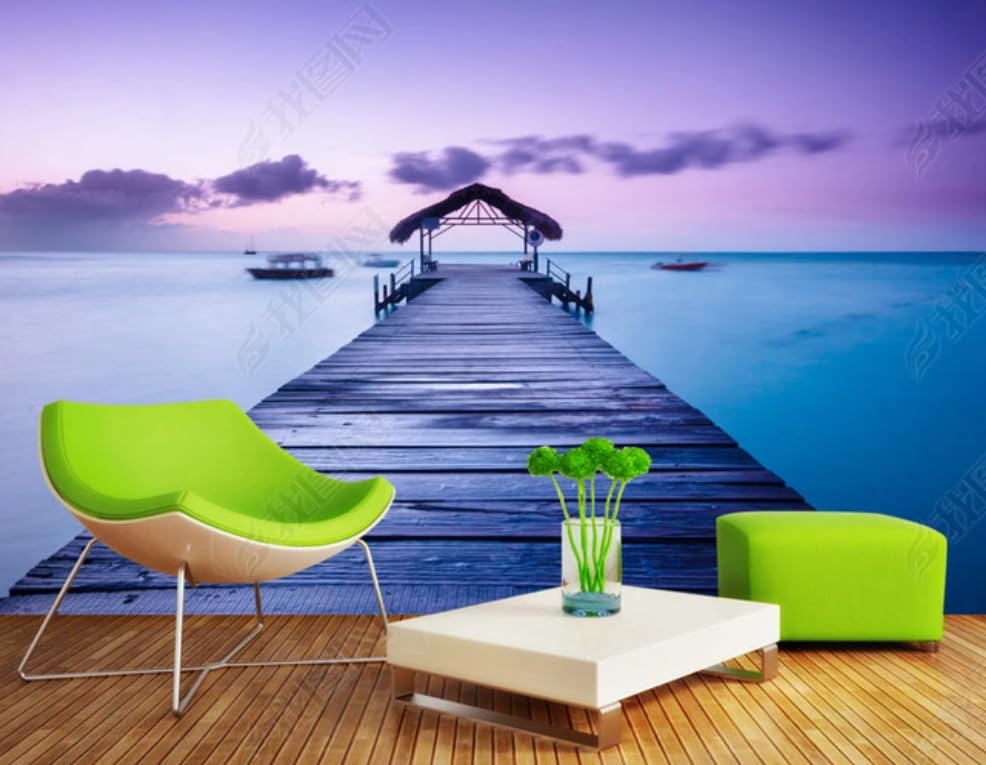 Papier peint intissé Maldives vue sur la mer pour créer une ambiance évasion dans la chambre
