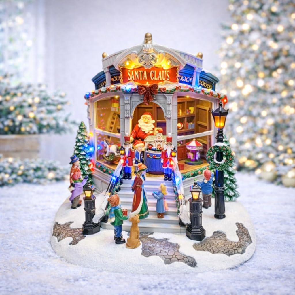 Animated Christmas Village Santa’s Toy Shop by Moments in Time LED Lighted Building with Music and Motion Plug-in Adapter Included Holiday Village Decoration 15.3”H