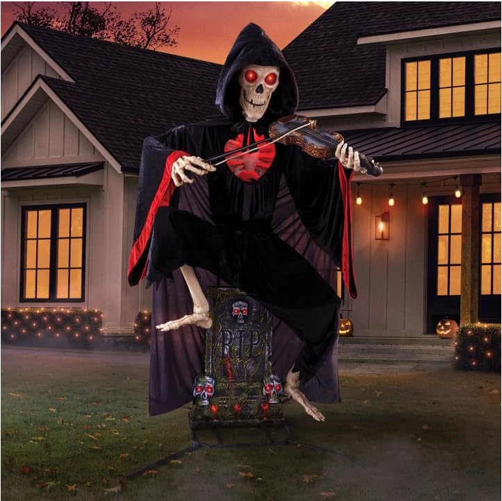 Front view of the 9-Foot Pre-Lit Animated Graveyard Violinist Reaper with glowing red eyes and chest, holding a violin and bow, standing on a tombstone base.