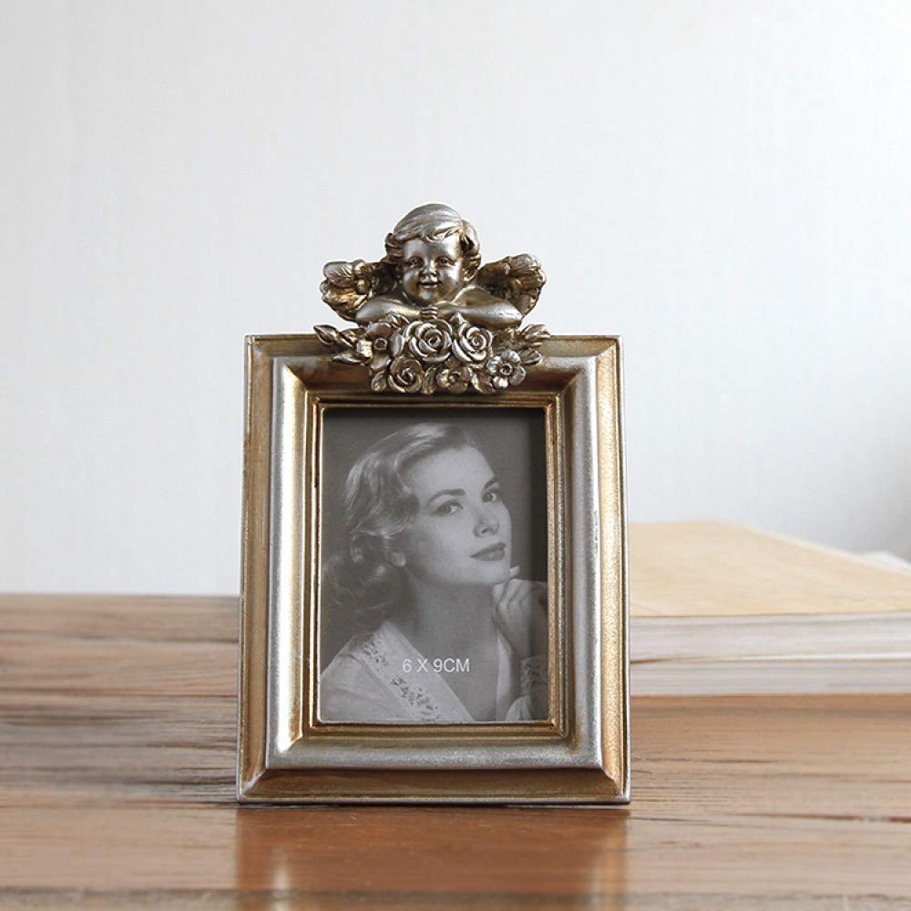 Cadre photo doré d'exception style baroque avec moulures ange sculpté