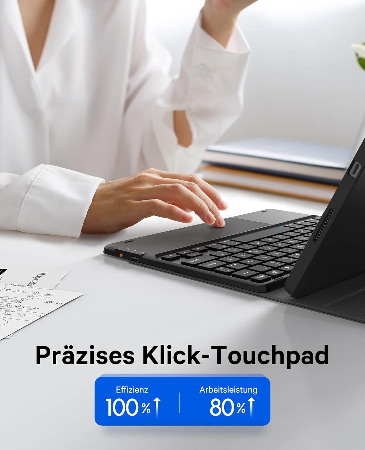 Close-up image of a hand using the precision touchpad on the Earto keyboard, indicating improved efficiency and productivity.