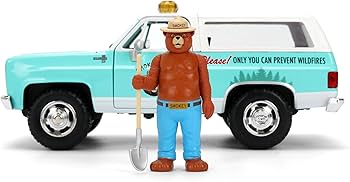 JADA 1980 シボレーブレーザー & スモーキーベアー・フィギア Amazon.com: Jada Smokey Bear 1980 Chevy Blazer Die-Cast Car Toys