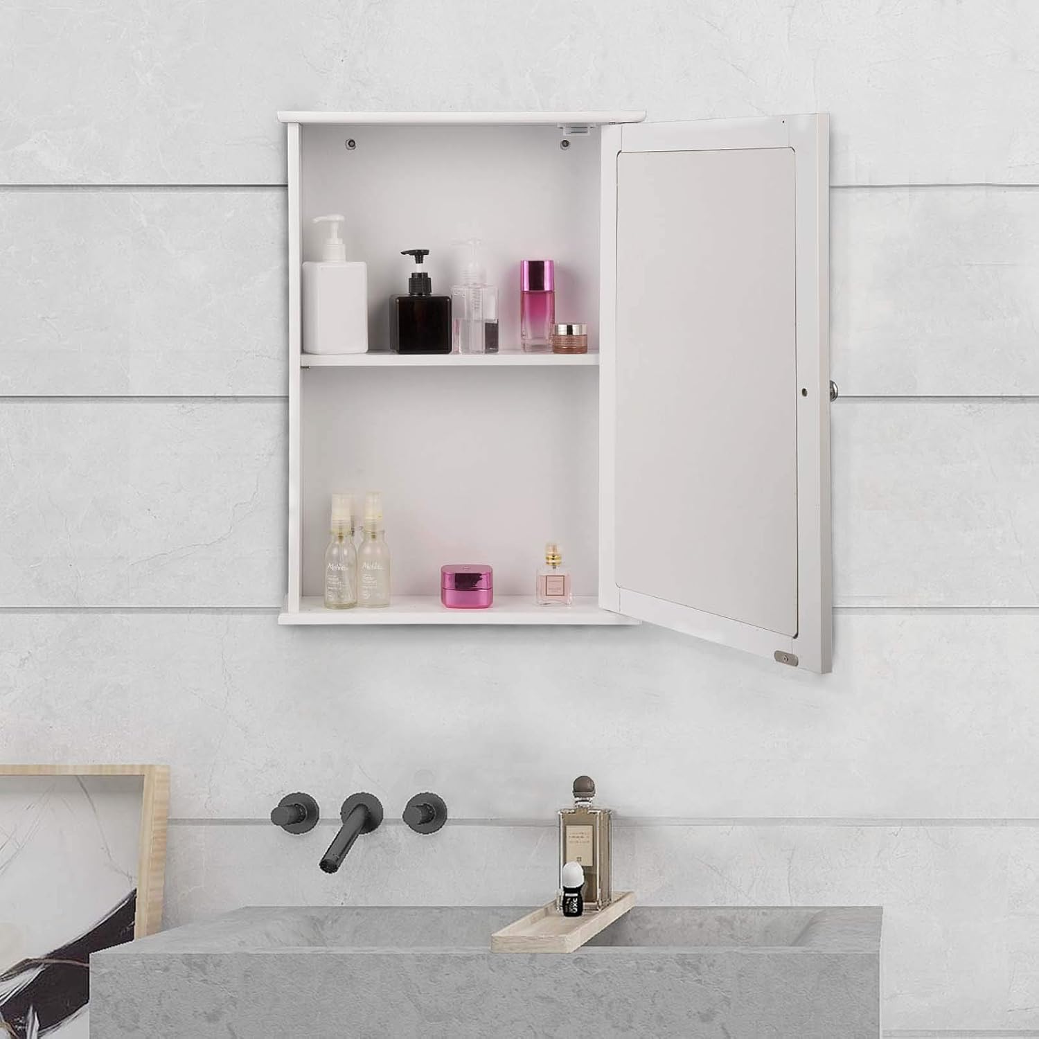 EUGAD Bathroom Mirror Cabinet mounted in a bathroom with items inside