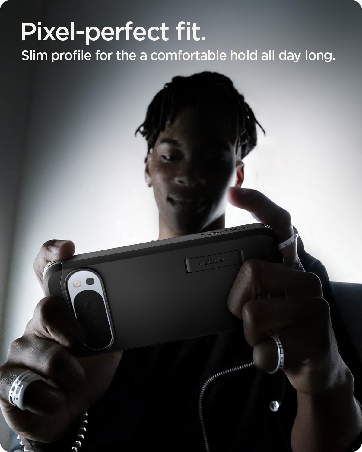 Image showing a Google Pixel phone in the Spigen Tough Armor MagFit case interacting with various MagFit accessories, including a wireless charger and a magnetic wallet.