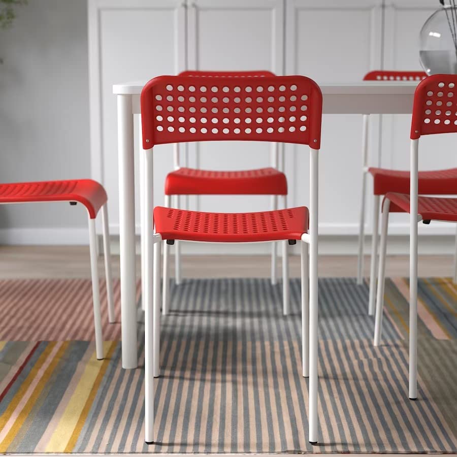 Ikea Light, airy and Stackable adde Chair(red). 1