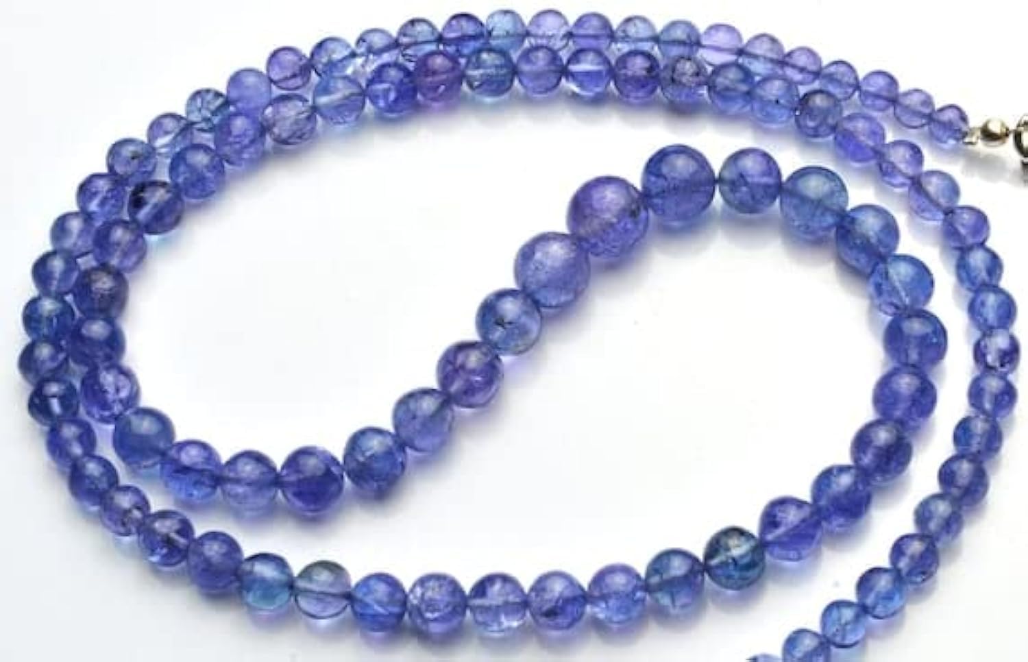 Perles en tanzanite naturelle pour création de bijoux uniques haut de gamme