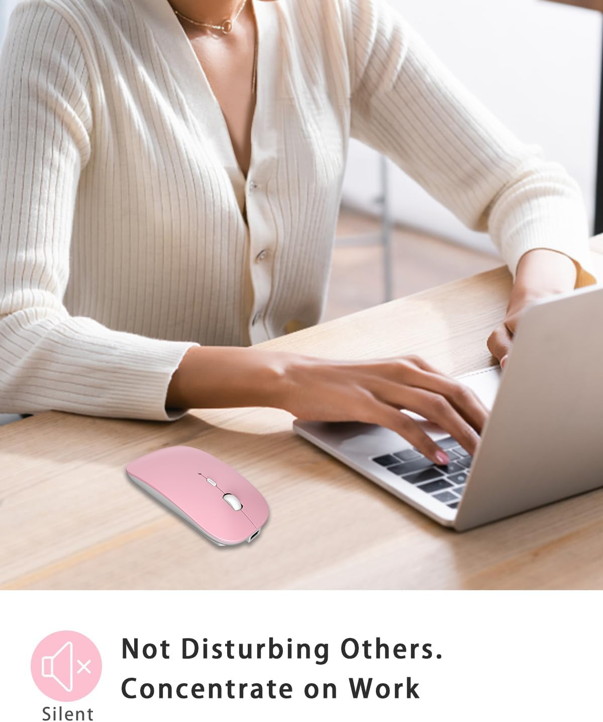 Person using the pink wireless mouse with a laptop, highlighting its silent operation