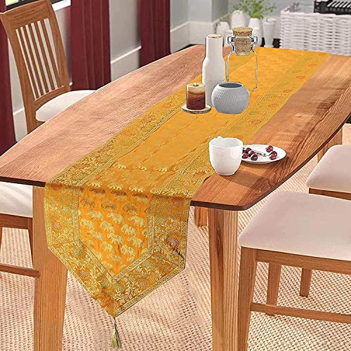 Image of Traditional Brocade Silk Table Runner for Living Room 4 to 6 Seater Dining Table Runner Elephant End Tassels 14x80 Inches (Mustard Yellow)