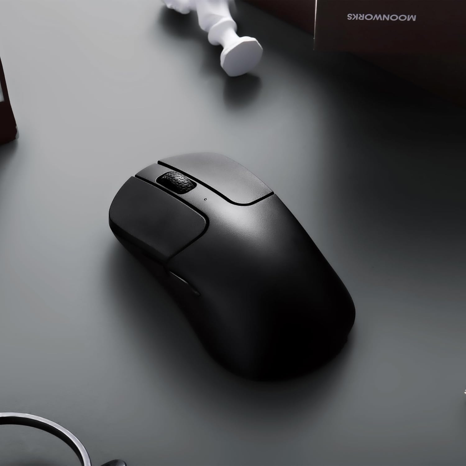 Underside of Keychron M3 Mini 4K mouse showing DPI and Report Rate buttons