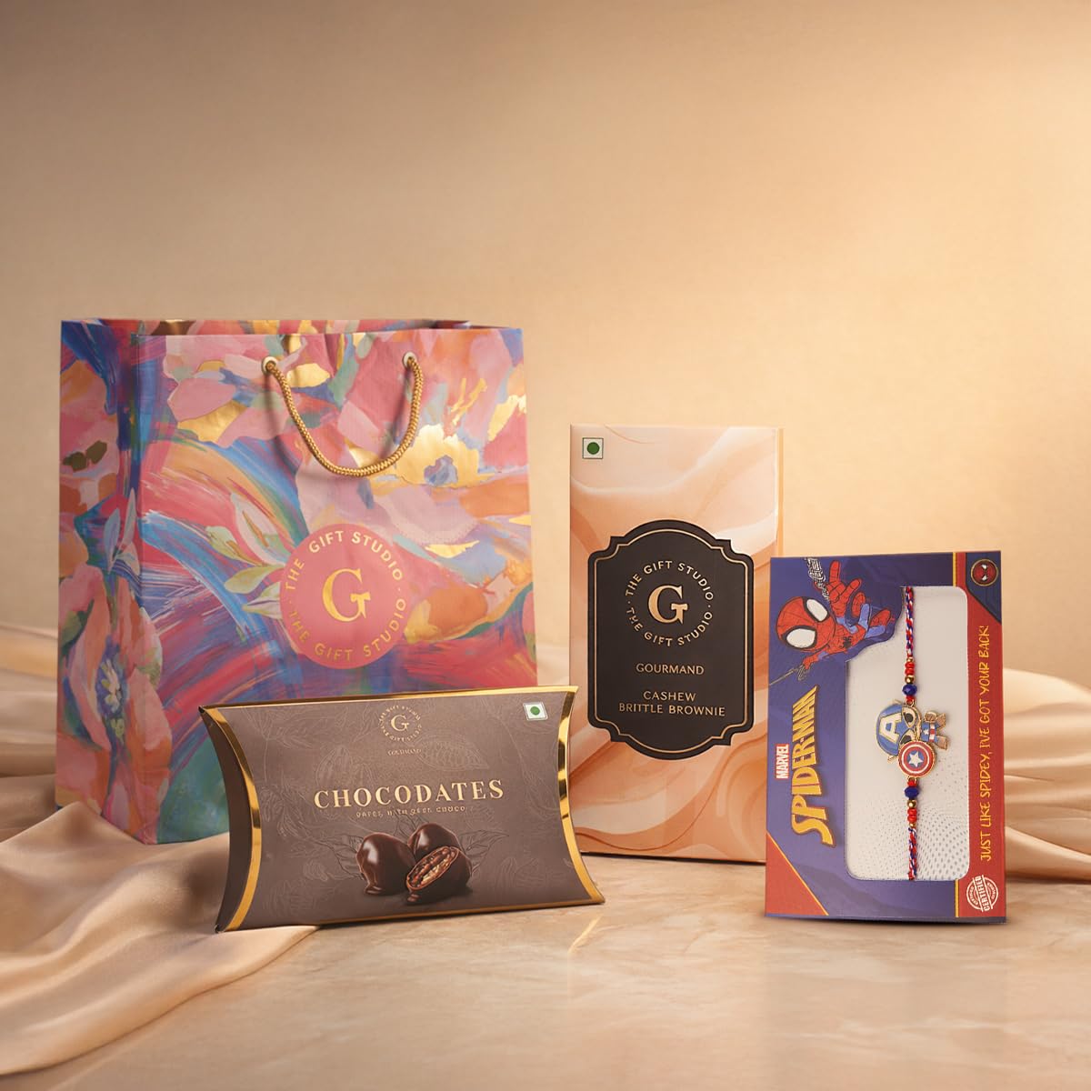 THE GIFT STUDIO.COM | Marvel Captain America Rakhi Hamper for Kids | Cashew Brittle, Chocodate & Floral Bag | Raksha Bandhan Gift-image-31