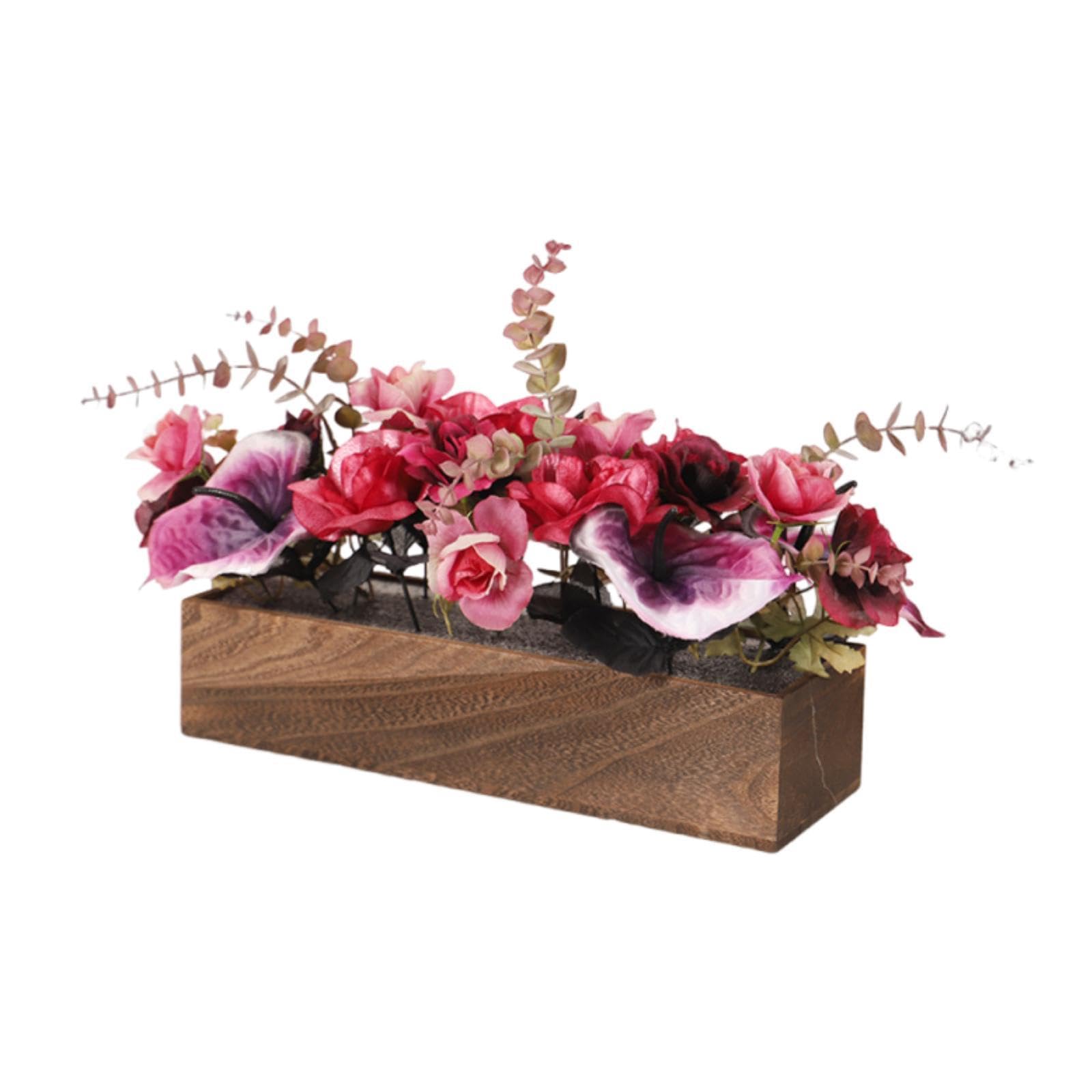 Jardiniere avec fleurs artificielles pour verdir les pieces sombres