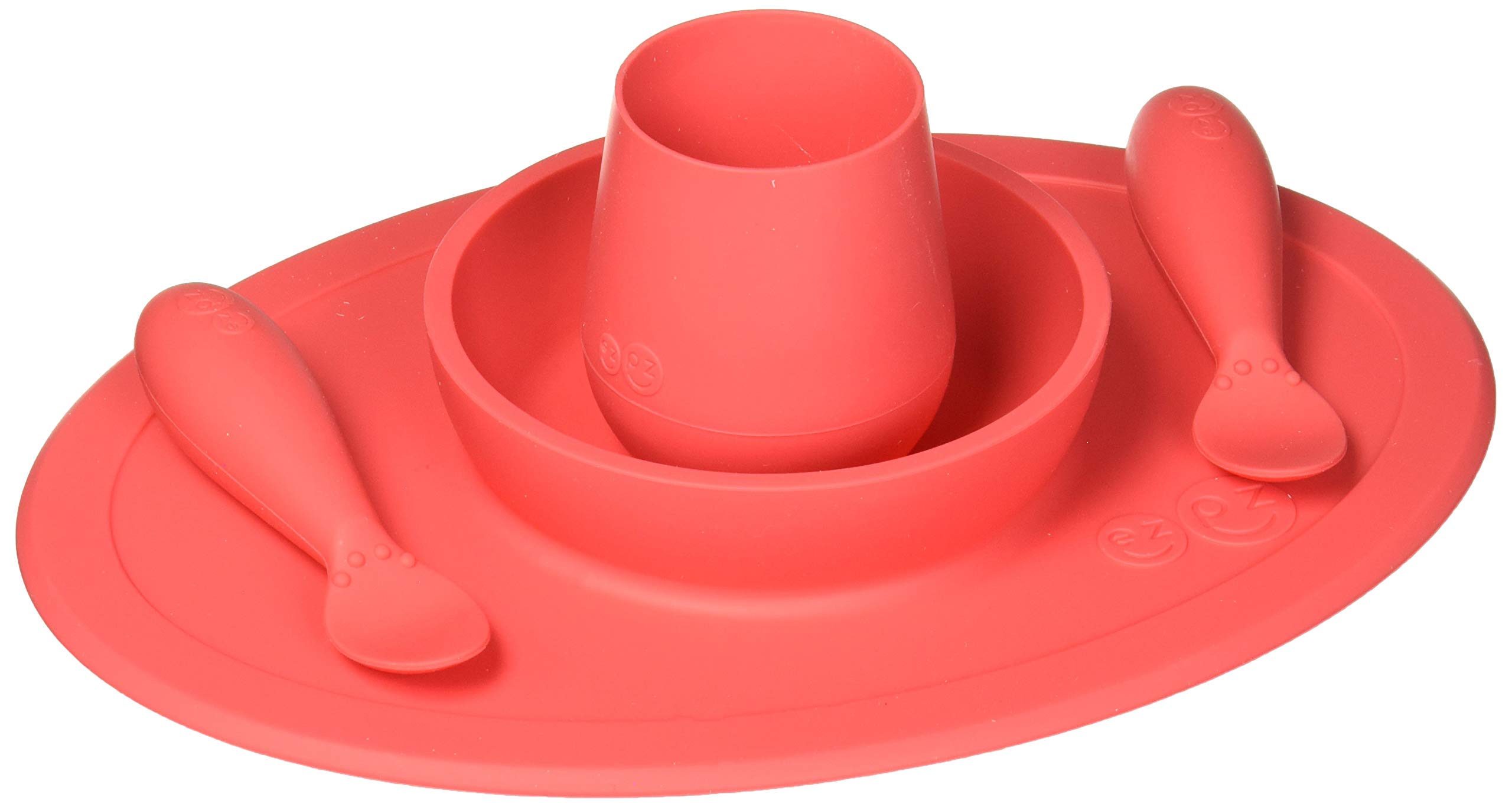 ezpz First Food Set - 100% Food Grade Silicone Suction Bowl with Built-in Placemat, Training Cup & Spoon - Designed by a Pediatric Feeding Specialist - Promotes Self Feeding - 6 Months+ (Coral)